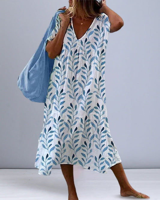 Trendy midi jurk met bladerenpatroon en V-hals – Nea