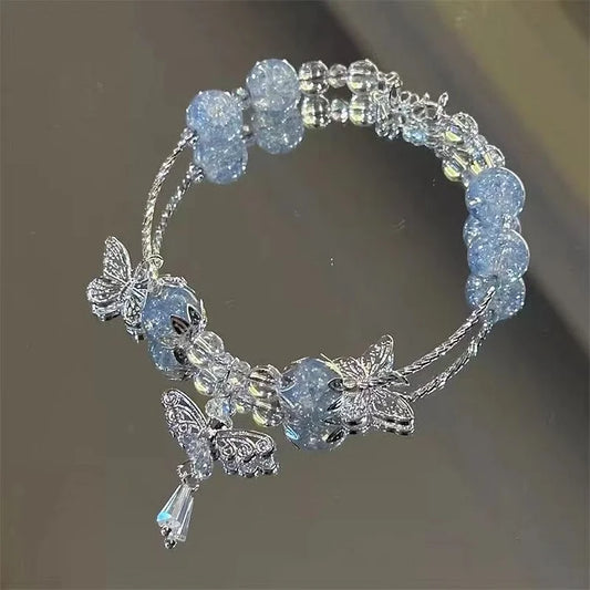 Hemelsblauwe Vlinderarmband met Bloemenmotief - Lila