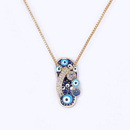 Gouden Ketting met Flip Flop Hanger en Boze Oog - Selma
