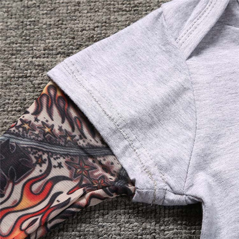 Babybody met lange mouwen en tattoo-print op de mouwen – Rockbaby
