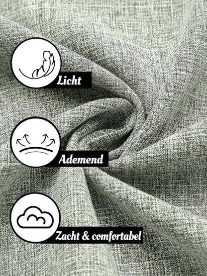 Close-up van de gedraaide, grijsgroene gemêleerde stof met drie iconen die lichtheid, ademend vermogen en comfort aanduiden 21