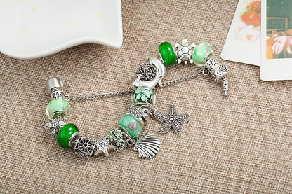 Zeeschelp en Zeester Bedel Armband